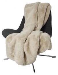 Beige fluffy blanket, soft and cozy throw for living room or bedroom.
