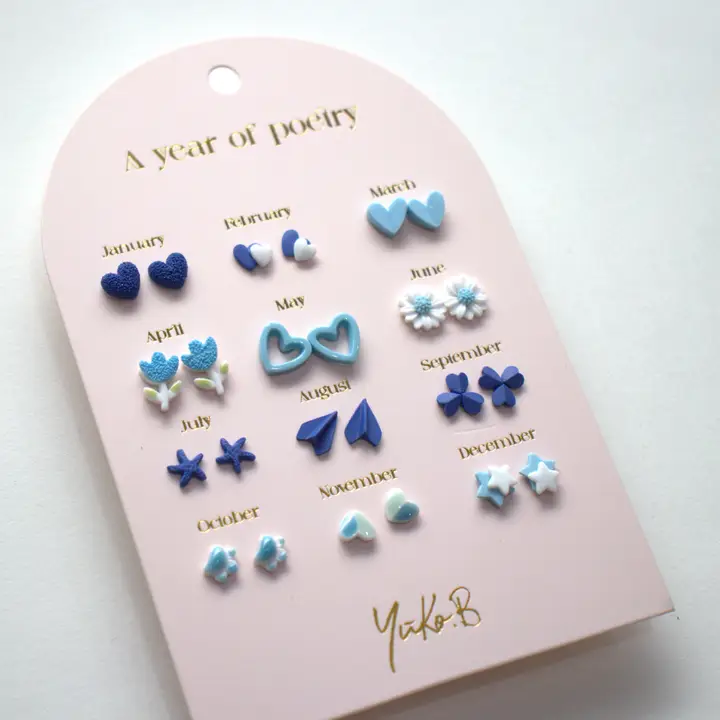 A Year of Blue Poetry Earrings - English version
