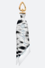 Keychain with abstract marble pattern in rose gold, gold, silver, and gray colors.