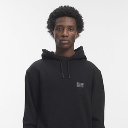  Black hoodie with drawstring, long sleeves, kangaroo pocket, minimalist design, comfortable fit.