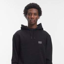 Black hoodie with drawstring, long sleeves, kangaroo pocket, minimalist design, comfortable fit.