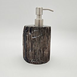 Petrified wood soap dispenser with a stainless steel pump. Unique natural texture and color.