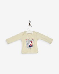 A cream-colored baby tee-shirt with a Red Riding Hood-inspired graphic design featuring a girl in a red hooded cape surrounded by forest elements like trees and mushrooms. The shirt is made of 100% organic cotton and is certified OEKO-TEX.