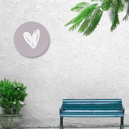 Round wall decor with tropical leaf design, available in multiple sizes from 20 cm to 60 cm diameter. Features a minimalist 'Zonnete' text in a circular frame.