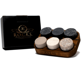 Chilling stones made of natural materials in various colors and shapes, including round, oval, and irregular forms. Suitable for cooling drinks without diluting them.