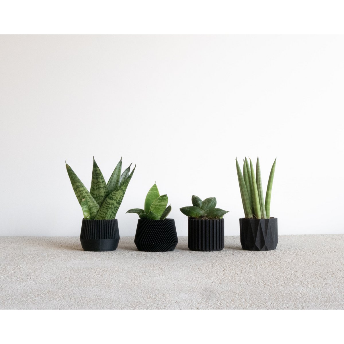 Set of 4 Black plant pots – Oslo Origami Kobe Stockholm