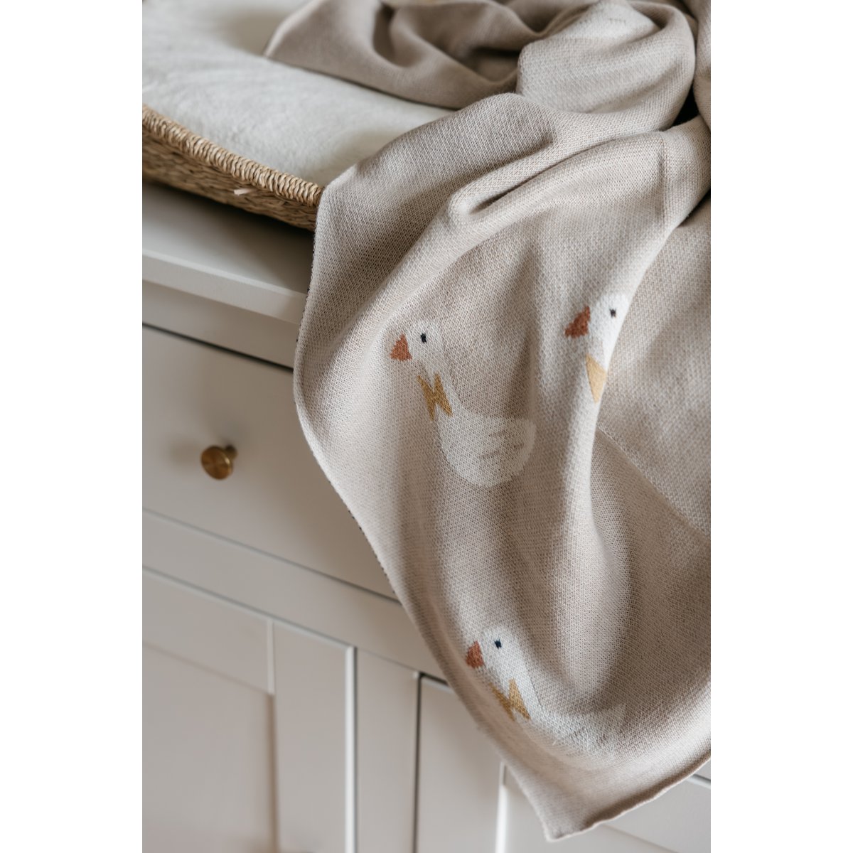 Gebreide katoenen babydeken, beige ganzen