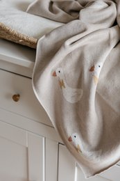 Gebreide katoenen babydeken, beige ganzen