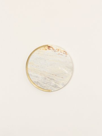 Round natural stone bottle coaster with half edges in brass