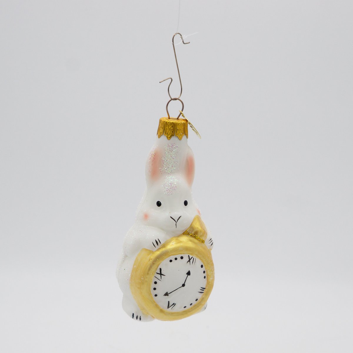 Conejito con decoración de árbol de reloj mágico