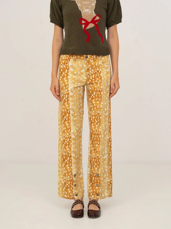 Jeans in denim con stampa cervo