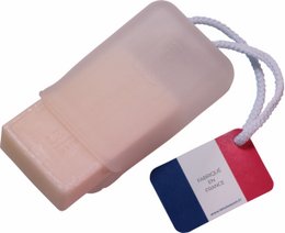 Translucent soap case made of a soft, lightweight material with a hanging cord for easy storage.