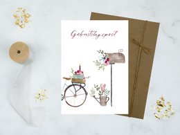 Whimsical birthday card with a bicycle and floral decorations, perfect for sending birthday wishes.
