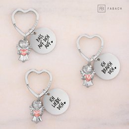 Llavero ángel de la guarda "Te amo" - estrella ángel de la guarda con corazón y placa grabada con mensaje amoroso