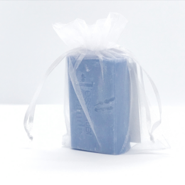 Organic shea butter and lavender soap bar, a soothing and moisturizing soap with natural ingredients.