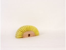 Yellow pleated fan-shaped decorative hair accessory with brown center detail.