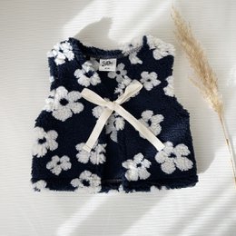 Navy blue baby waistcoat with white floral pattern, suitable for babies aged 62-92 cm.
