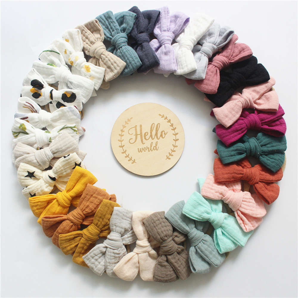 Annie & Charles® baby pandebånd sæt med muslin sløjfe