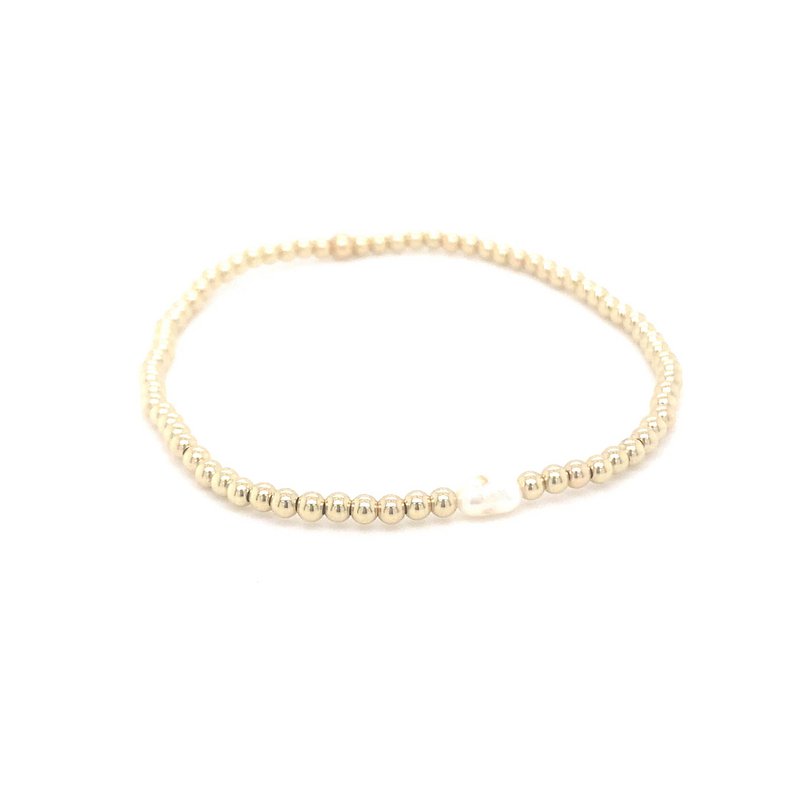 Gold ball bracelet with single pearl