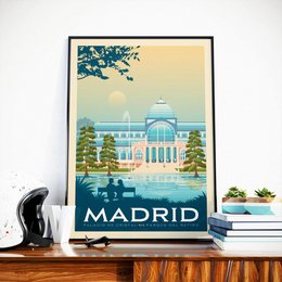Vintage Madrid poster featuring a classic architectural landmark, the Palacio de Cristal, set against a scenic landscape with trees and a blue sky. The poster has a retro, travel-inspired design in shades of blue, green, and yellow.