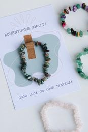Ceramic compass-shaped cards in a warm, earthy color palette. Features a simple compass design, perfect for friendship or adventure-themed gifts.