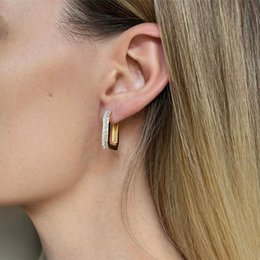ELETTRA - Geometric earring in gold-plated steel