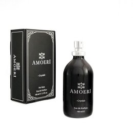 Elegant glass perfume bottle with ornate black and silver design. Floral, woody fragrance in a classic perfume bottle.