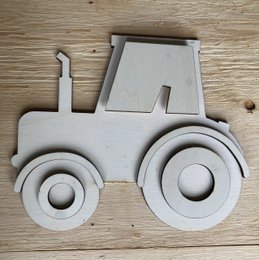 A white wooden tractor-shaped night light for kids' rooms. Features a simple, minimalist design with a tractor shape and round wheels.