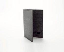 Passport holder in recycled leather, available in Gris, Ivoire, and Crème colors. Made of durable recycled leather, this compact passport holder is perfect for travel.