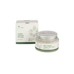 White anti-aging face cream in a pump bottle. Contains natural ingredients for skin rejuvenation.