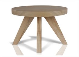 Large round natural wood side table with three angled legs.