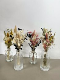 Small dried flower bouquet in glass vases with green, white, beige, yellow-green, and pink colors.
