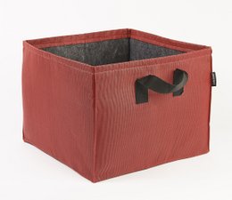 A red, square fabric plant pot with a graphic of a dog on the side. The pot is made of a durable, water-resistant material and is suitable for indoor or outdoor use.