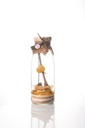 Preparation for arranged rum "Yuzu Candied Lemons" 50 CL, DIY product with candied lemon slices and a decorative topping.
