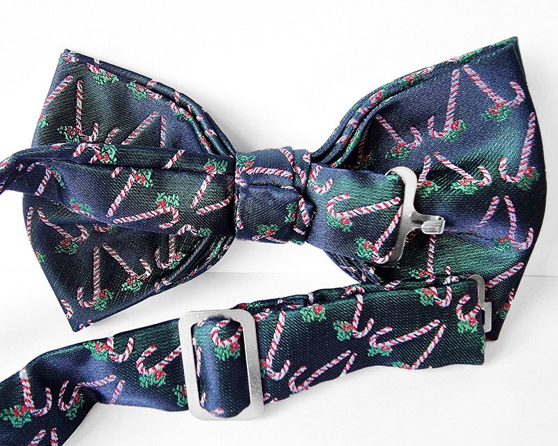 Papillon: blu scuro con bastoncini di zucchero