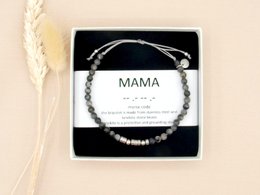 Elegant silver and gold-toned bracelet with Morse code charm, perfect for mothers.