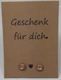 Toll stainless steel earring on card in German language (set10)