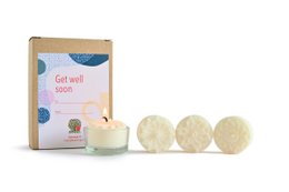 Round, white tealight candles in a gift box with the text "Get well soon" printed on the box.