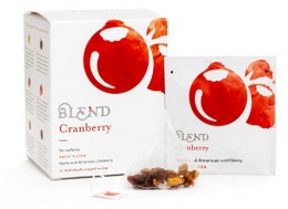 Cranberry - 15 Pyramid Box. A box of 15 pyramid-shaped tea bags containing a blend of cranberry and other natural ingredients. The tea is made from high-quality cranberries and has a tart, fruity flavor.