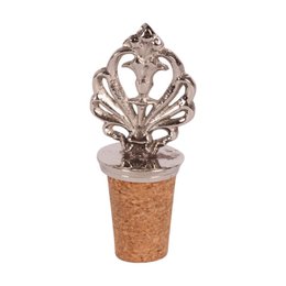  Decorative bottle stopper with a floral-inspired metal design and cork base.