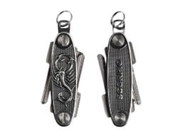 Compact key organizer with scorpion design, made of durable metal for secure key storage.