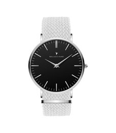 Sleek, minimalist black and white watch with a textured leather strap.