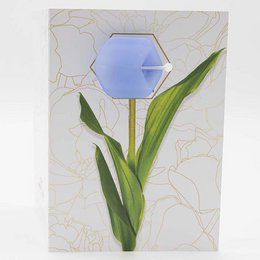  Greeting card with a cornflower-colored cube design and floral elements.