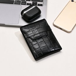Black croc-embossed leather wallet with coin pocket and 6 card slots. Elegant slim bifold design.