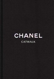 Hardcover book titled "Chanel Catwalk: The Complete Collections 69" showcasing fashion designs from the iconic Chanel brand.