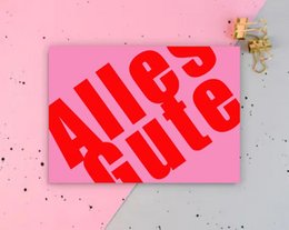 A vibrant red and pink postcard with the text "All the best" in a bold, stylized font. The postcard appears to be a simple, minimalist design suitable for a birthday card or other celebratory occasion.