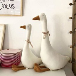 Soft, plush goose figurines in two sizes, 35cm and 55cm, made of high-quality materials with natural-looking details.