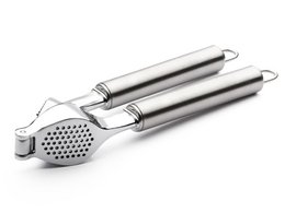 Garlic press with tubular handles