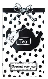 Black and white polka dot gift bag containing a tea bag and the text "Especially for you". The bag has a decorative bow on top.

The image shows a black and white polka dot gift bag containing a tea bag. The bag has a decorative bow on top and the text "Especially for you" is visible. This product would be suitable for a tea-related gift or purchase.
