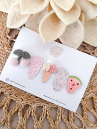 Pink glitter hair clips set, sweet summer design, girls accessories, antislip clips with sparkle details.